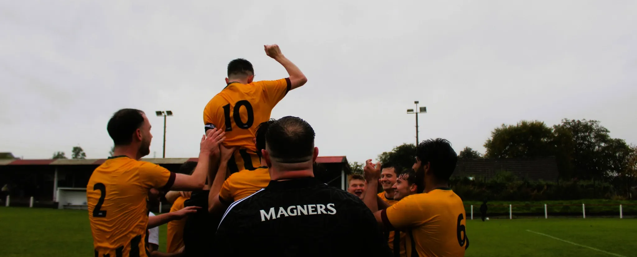 Members of the football team celebrating a win